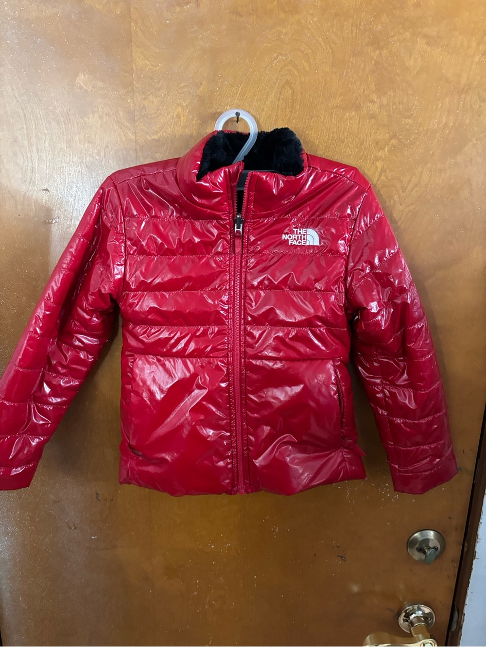 The North Face coat.  Girls. Red reversible